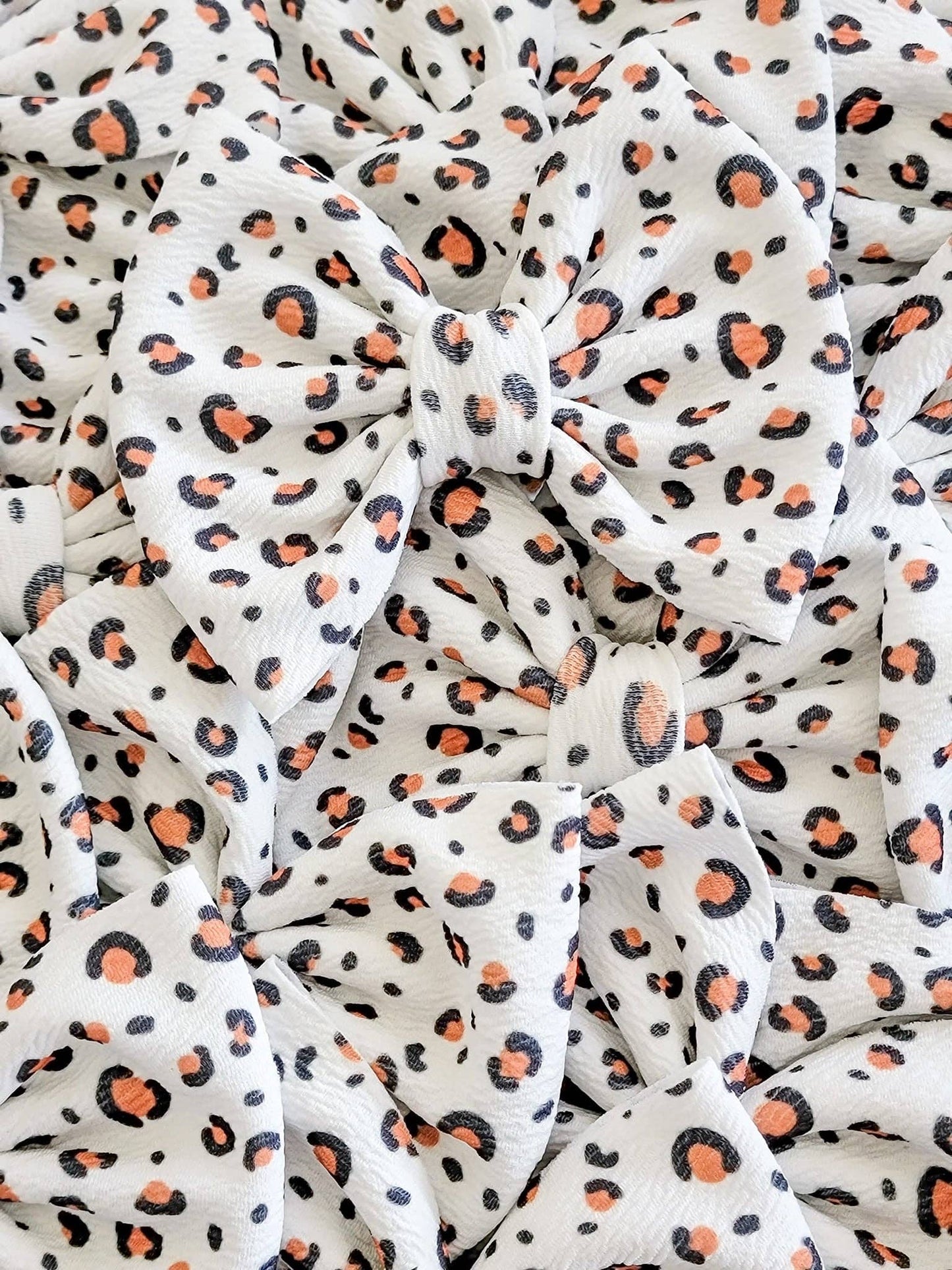 Savannah Bow-Neutral Tan Leopard