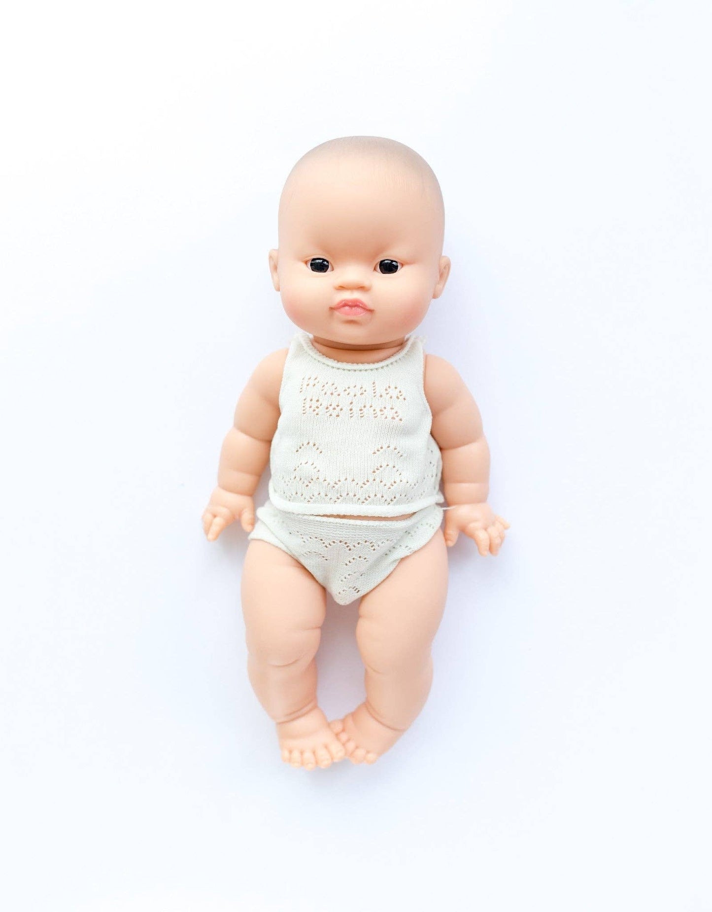 Lily with brown eyes in pajamas - Baby Gordis