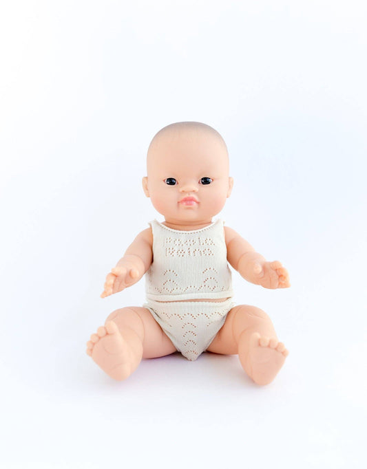 Henry with brown eyes in pajamas - Baby Gordis