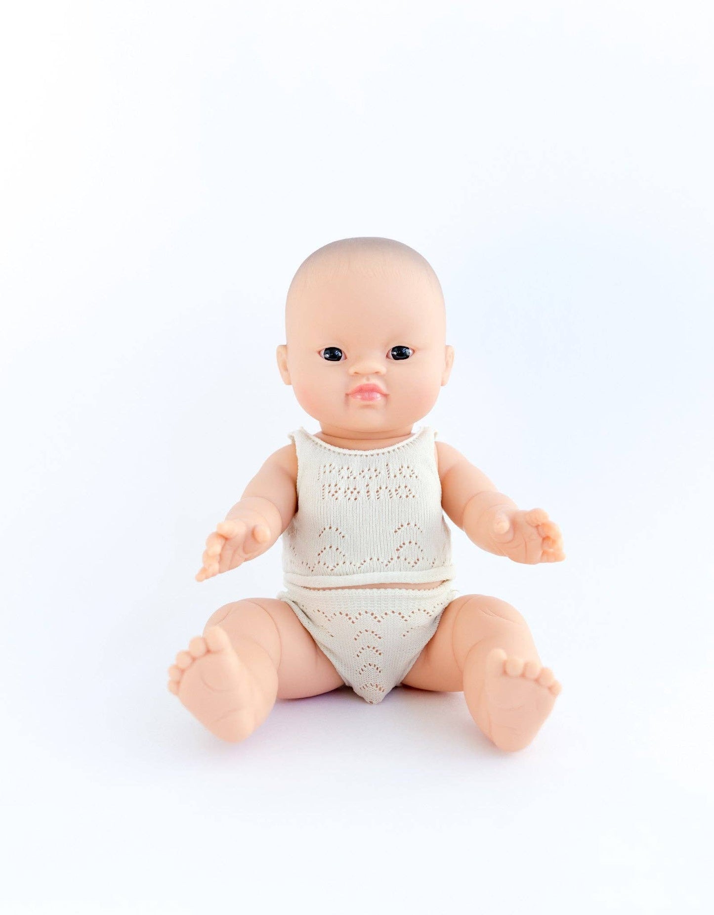 Lily with brown eyes in pajamas - Baby Gordis